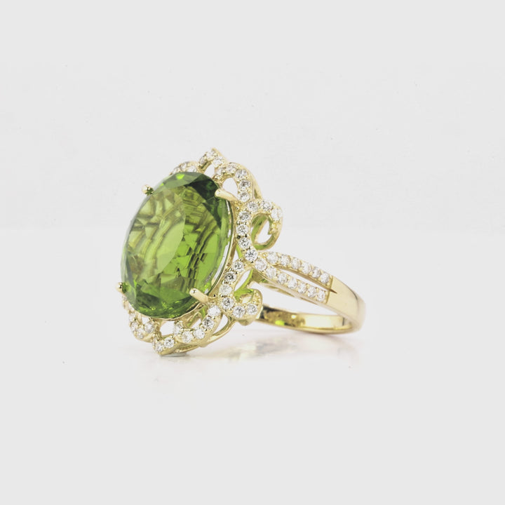 13.34 Cts Peridot and White Diamond Ring in 14K Yellow Gold