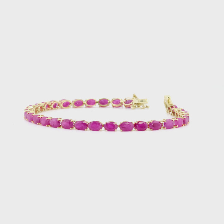 20.31 Cts Ruby Tennis Bracelet in 14K Yellow Gold