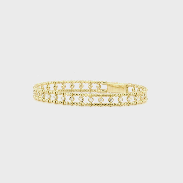 0.9 Cts White Diamond Flex Bangle in 14K Yellow Gold