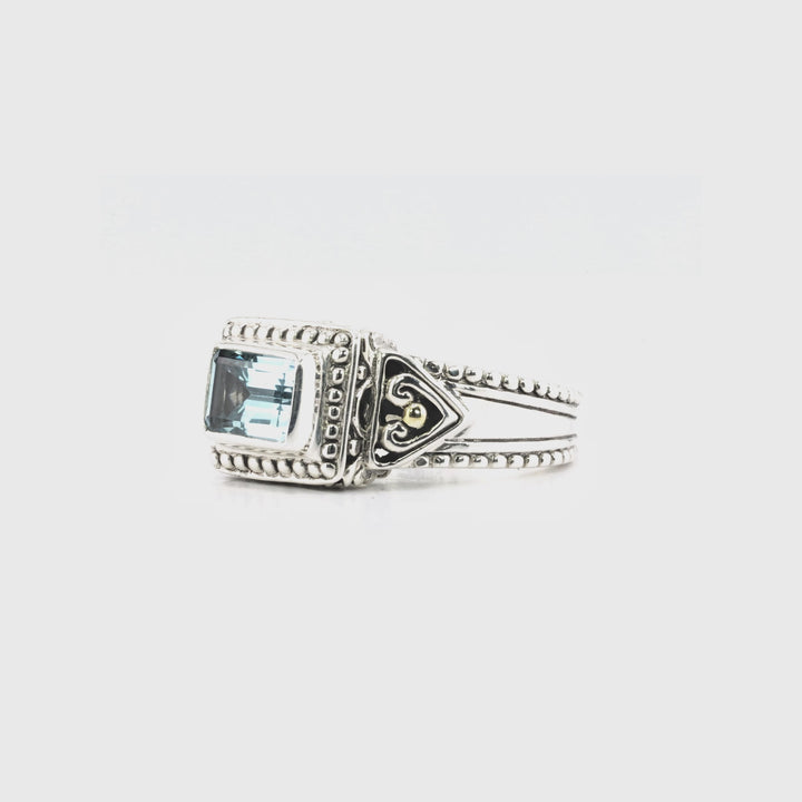 0.70 Cts Blue Topaz Halo Ring in Two Tone 925 Silver