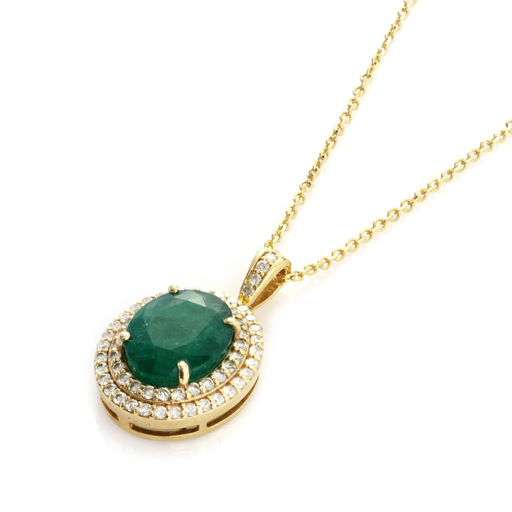 4.3 Cts Emerald and White Diamond Pendant in 14K Yellow Gold