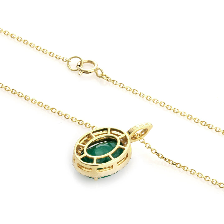 3.88 Cts Emerald and White Diamond Pendant in 14K Yellow Gold