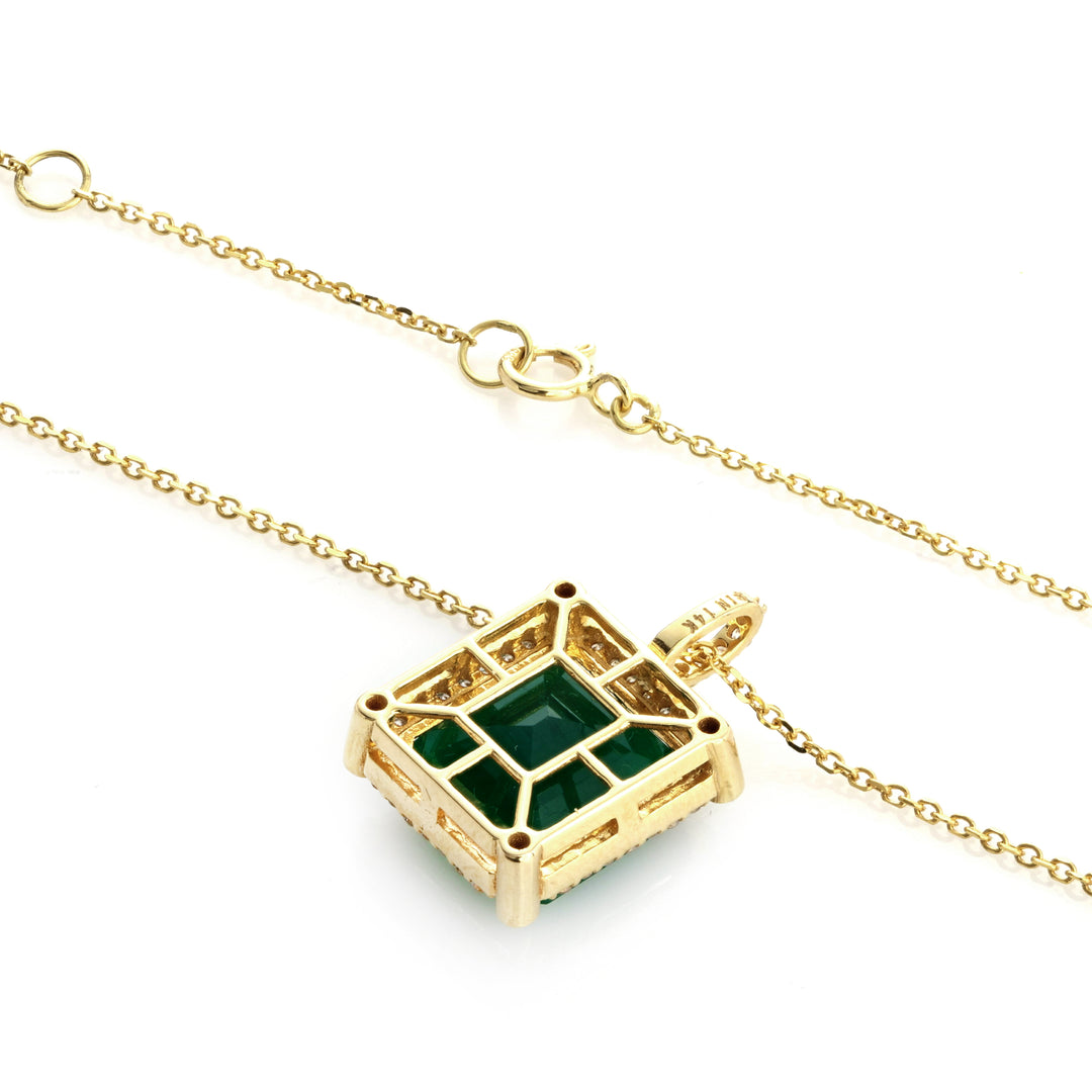 6.86 Cts Emerald and White Diamond Pendant in 14K Yellow Gold