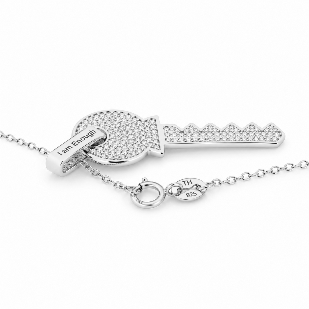 0.60 DEW Moissanite Key Pendant in 925 Platinum Plated