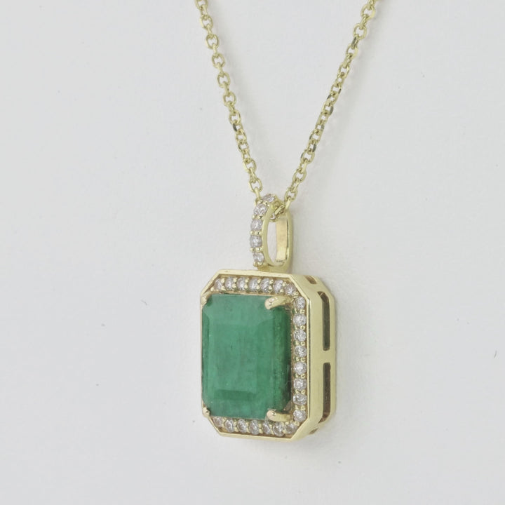 4.32 Cts Emerald and White Diamond Pendant in 14K Yellow Gold