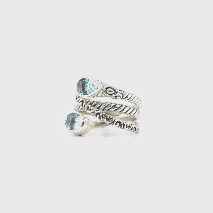 1.60 Cts Blue Topaz Crossover Ring in Oxidized 925 Silver