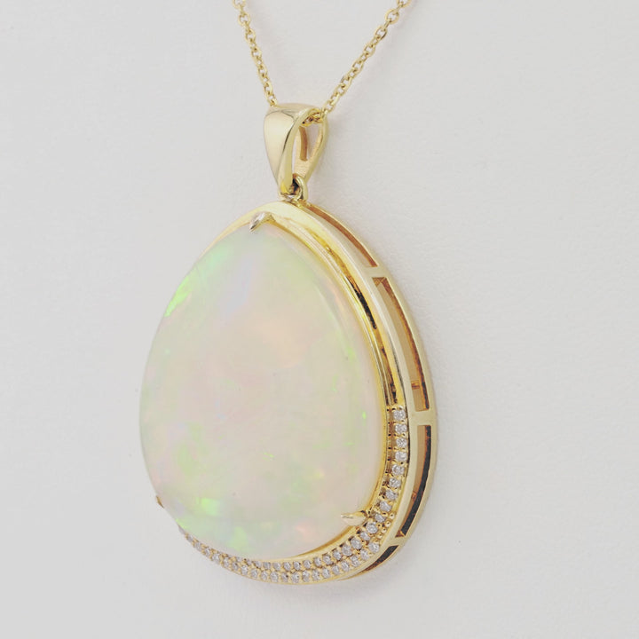 22.6 Cts Ethiopian Opal and White Diamond Pendant in 14K Yellow Gold