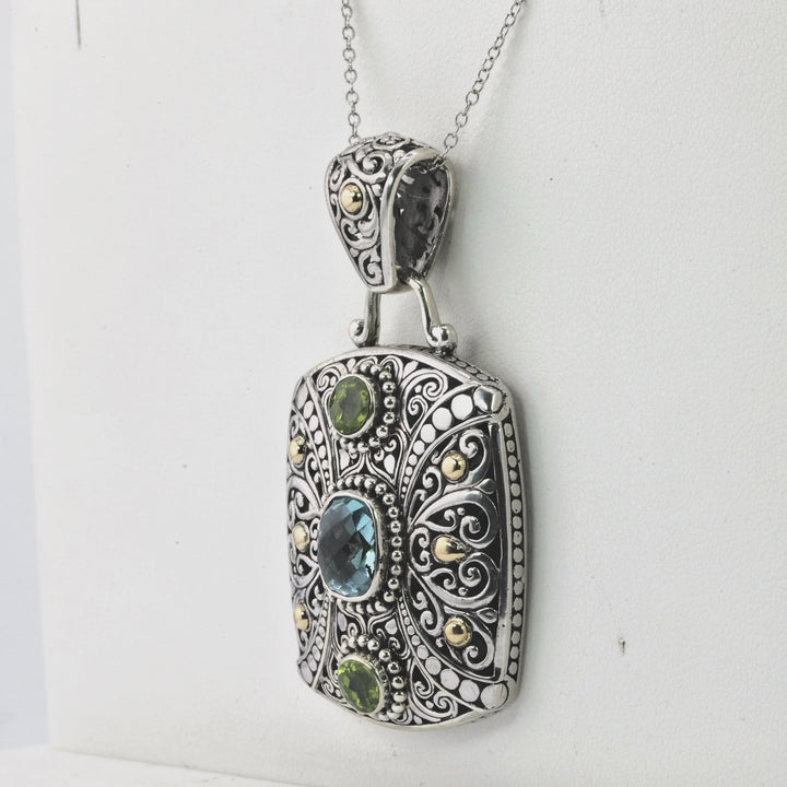 1.90 Cts Blue Topaz and Peridot Statement Pendant in Two Tone 925 Silver