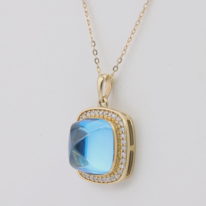 8 Cts Swiss Blue Topaz and White Diamond Pendant in 14K Yellow Gold