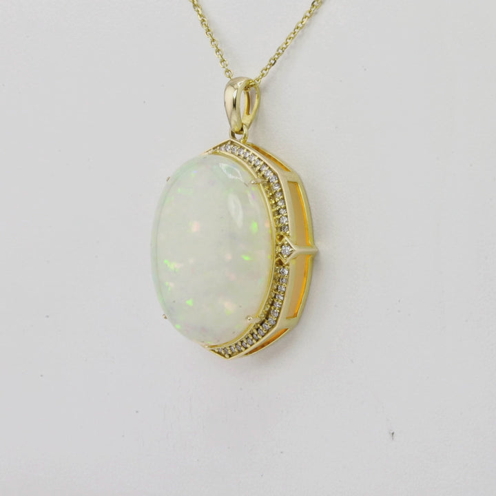 21.75 Cts Ethiopian Opal and White Diamond Pendant in 14K Yellow Gold
