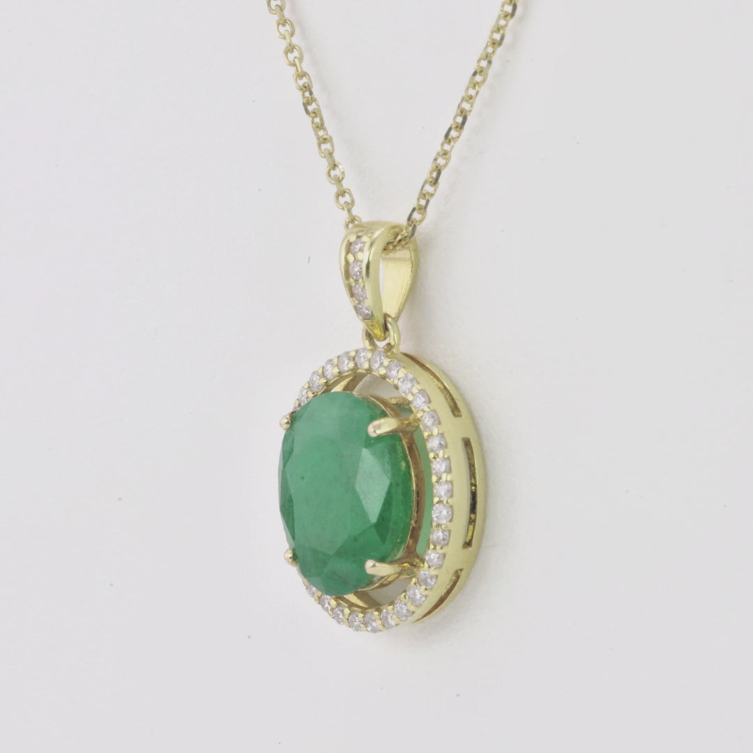 4.24 Cts Emerald and White Diamond Pendant in 14K Yellow Gold