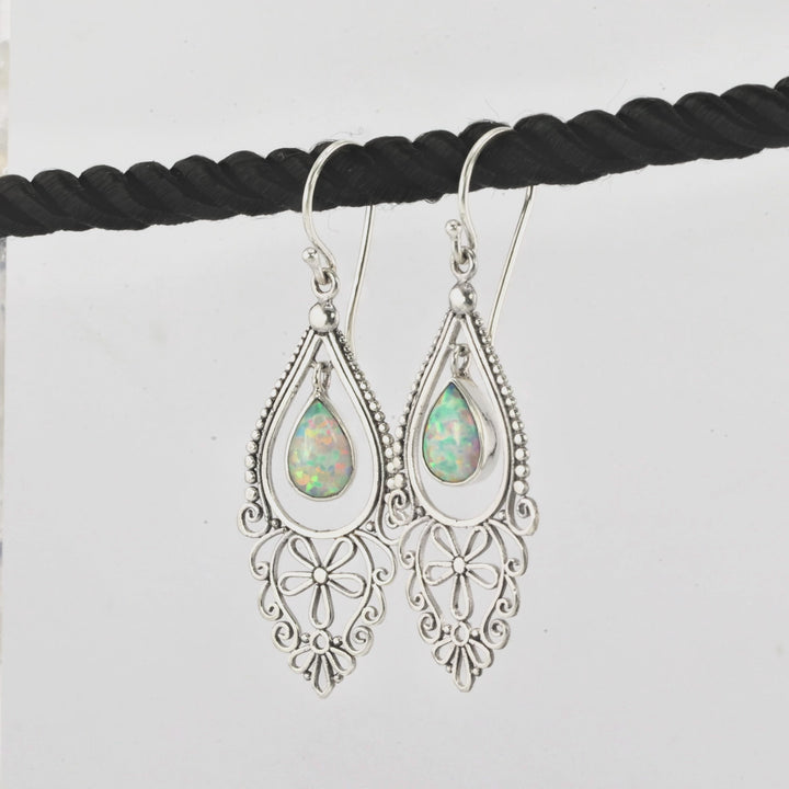 0.60 Cts Opal Dangle Earring in Oxidized 925 Silver